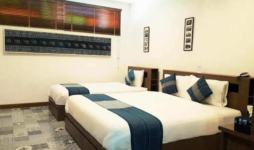 Bed in The Indigo House Phrae