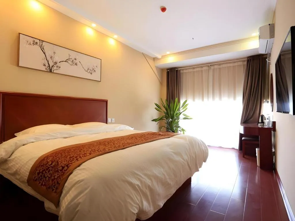 Bed in GreenTree Inn Shandong Yuncheng Ximen Street Songjiang Kung Fu School Business Hotel