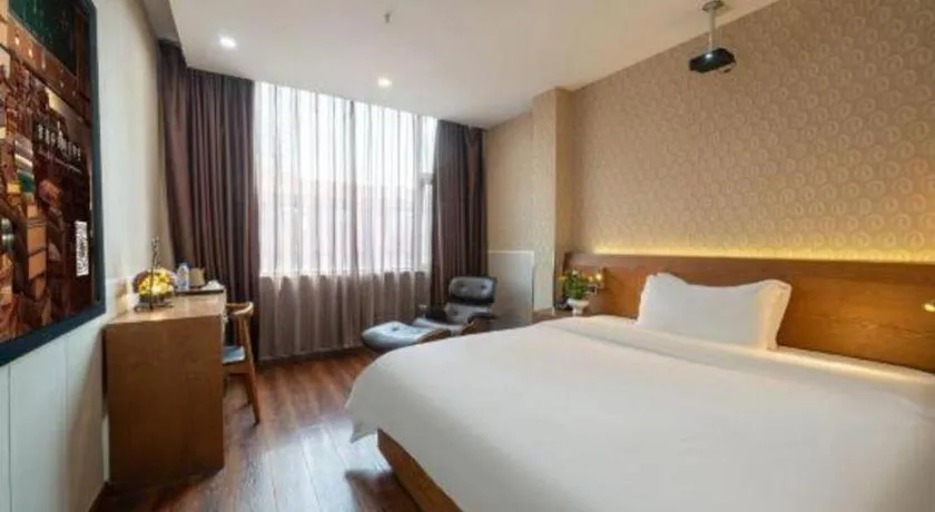 Bed in James Joyce Coffetel Wuxi Taihu Square Subway Station Branch