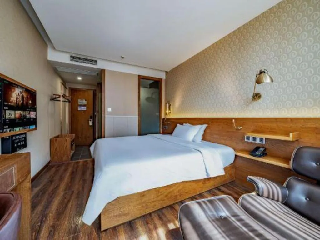 Bed in James Joyce Coffetel Wuxi Taihu Square Subway Station Branch