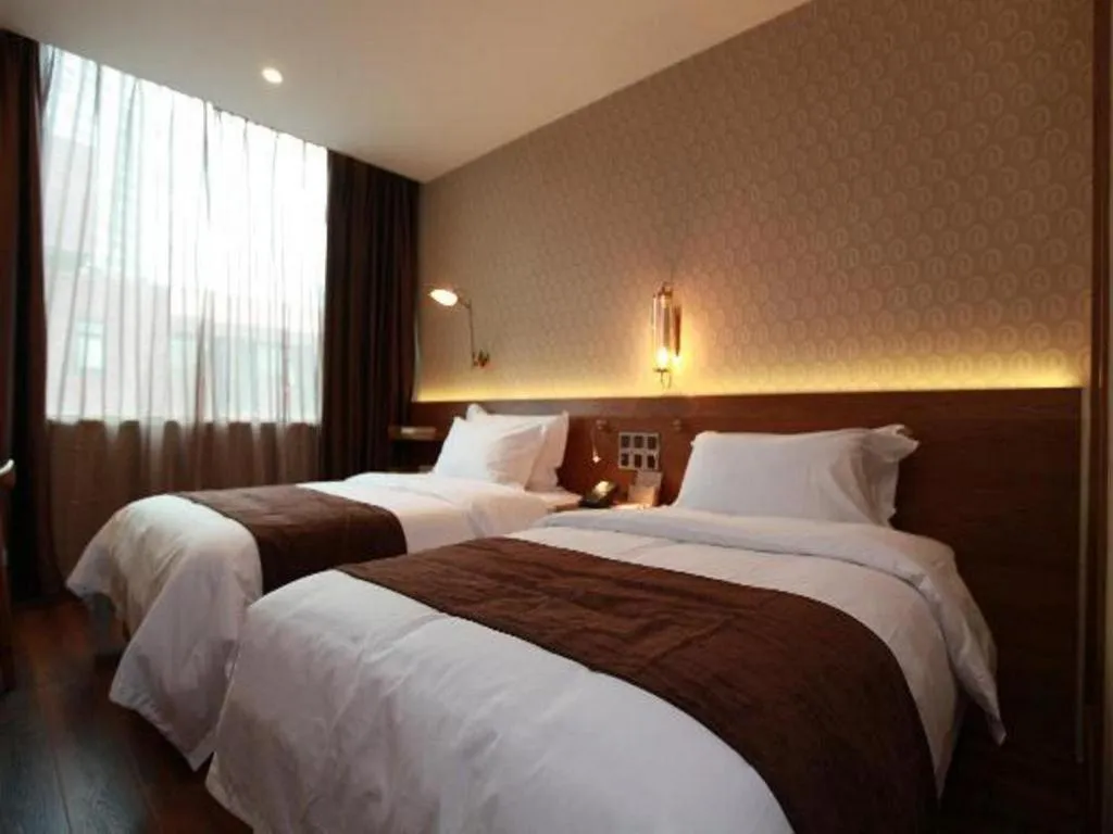 Bed in James Joyce Coffetel Wuxi Taihu Square Subway Station Branch