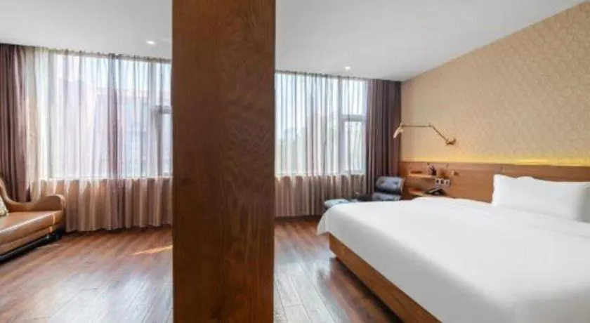 Bed in James Joyce Coffetel Wuxi Taihu Square Subway Station Branch