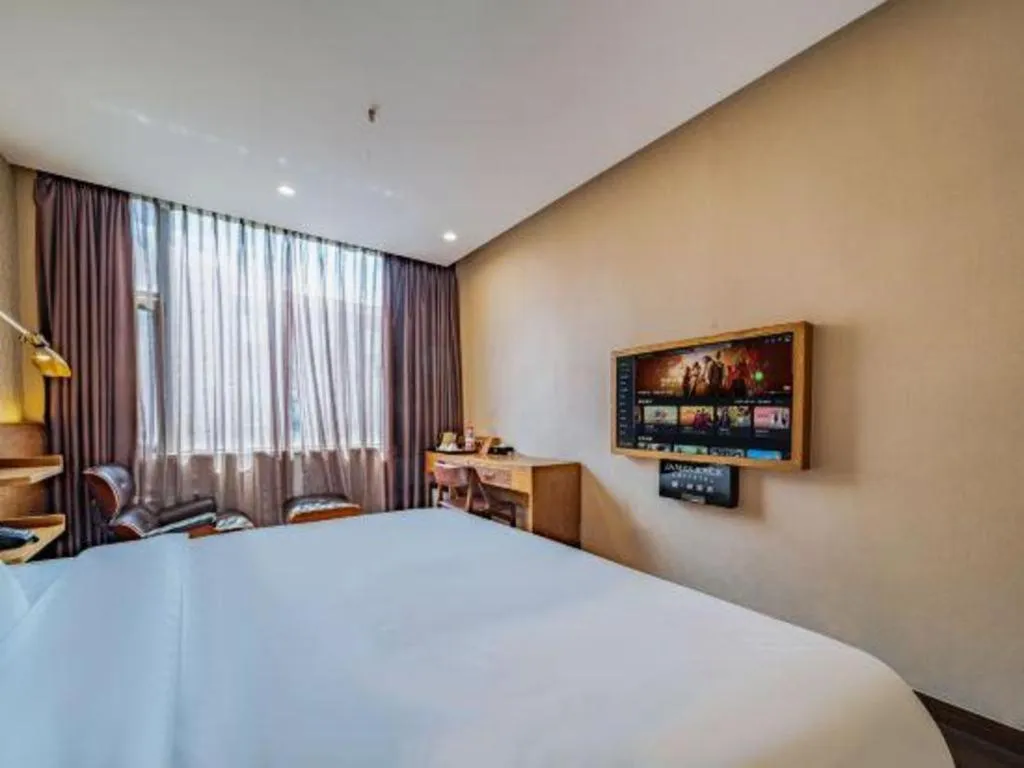 Bed in James Joyce Coffetel Wuxi Taihu Square Subway Station Branch