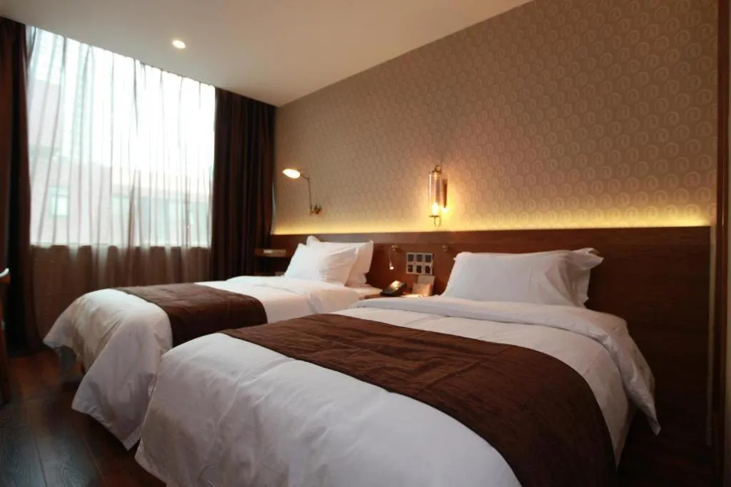 Bed in James Joyce Coffetel Wuxi Taihu Square Subway Station Branch