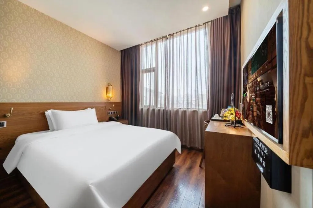 Bed in James Joyce Coffetel Wuxi Taihu Square Subway Station Branch