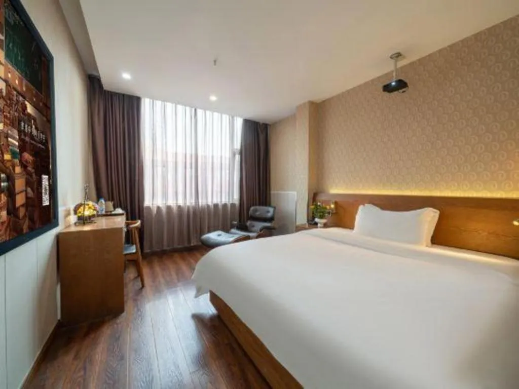 Bed in James Joyce Coffetel Wuxi Taihu Square Subway Station Branch