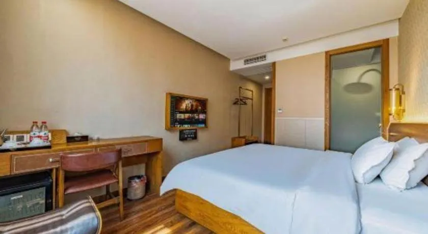 Bed in James Joyce Coffetel Wuxi Taihu Square Subway Station Branch