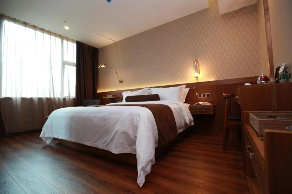 Bed in James Joyce Coffetel Wuxi Taihu Square Subway Station Branch