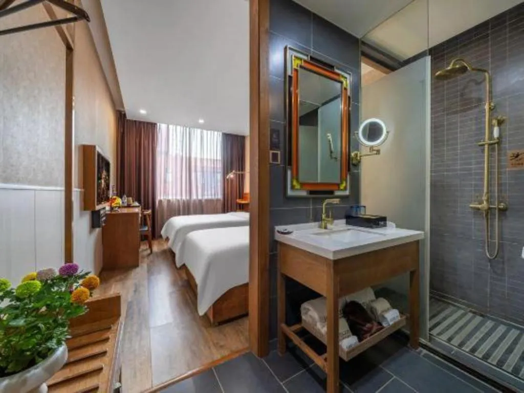 Bed in James Joyce Coffetel Wuxi Taihu Square Subway Station Branch