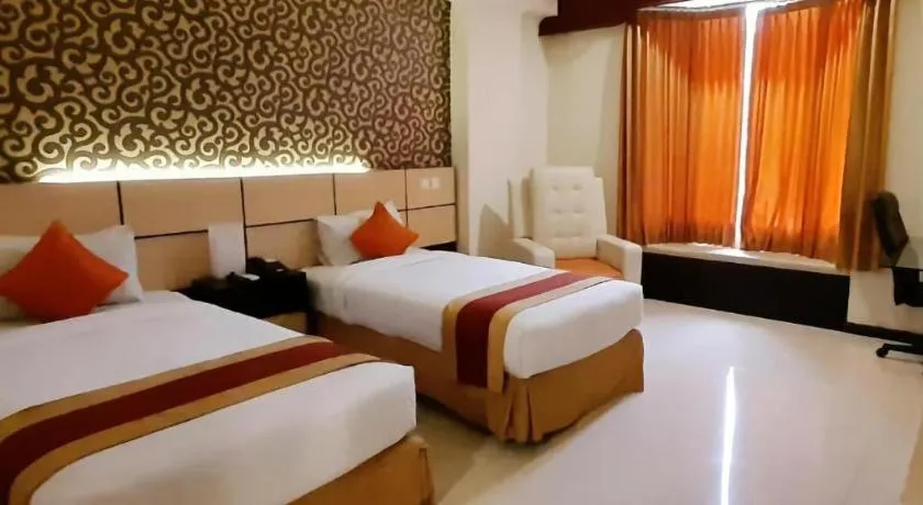 Bed in Grand Hotel Surabaya