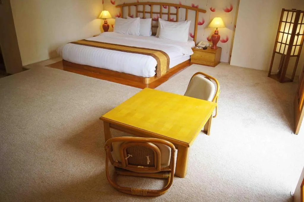 Bed in Grand Hotel Surabaya