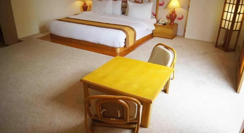 Bed in Grand Hotel Surabaya