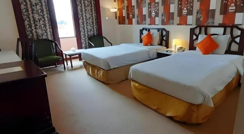 Bed in Grand Hotel Surabaya