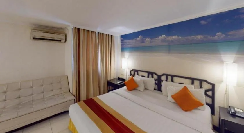 Bed in Grand Hotel Surabaya