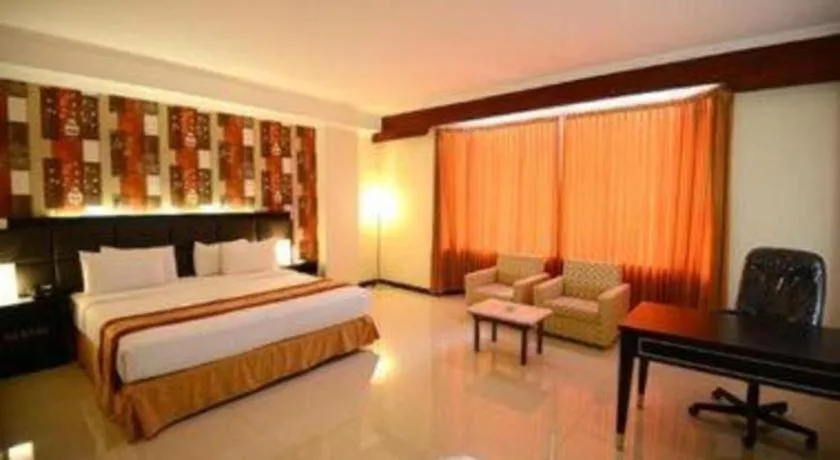 Bed in Grand Hotel Surabaya