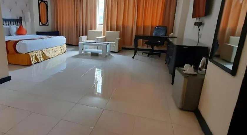 Bed in Grand Hotel Surabaya