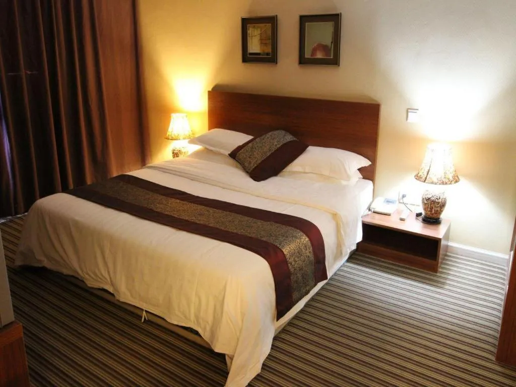 Bed in Pankun Business Hotel