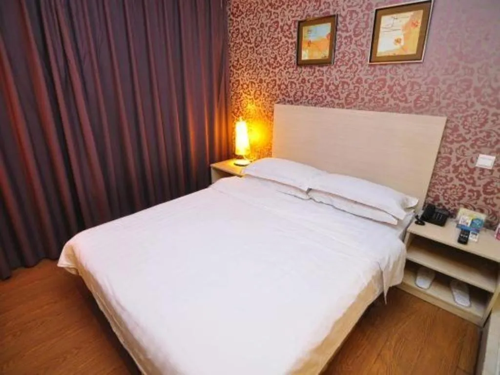 Bed in Pankun Business Hotel