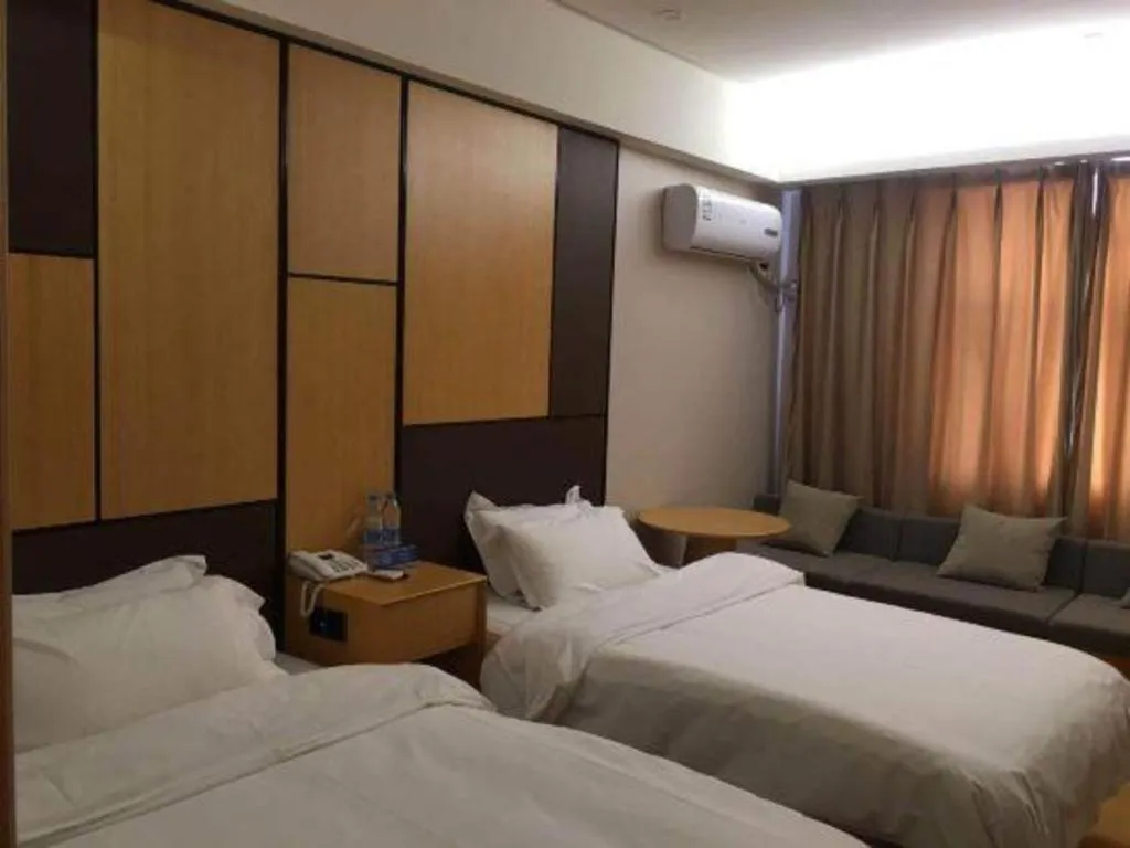 Bed in Pankun Business Hotel