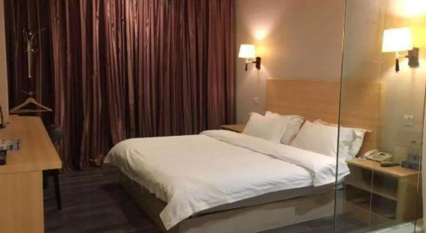 Bed in Pankun Business Hotel