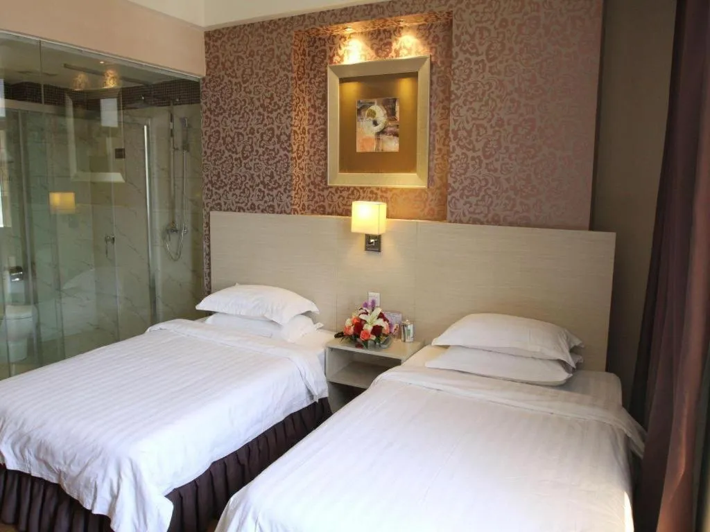 Bed in Pankun Business Hotel