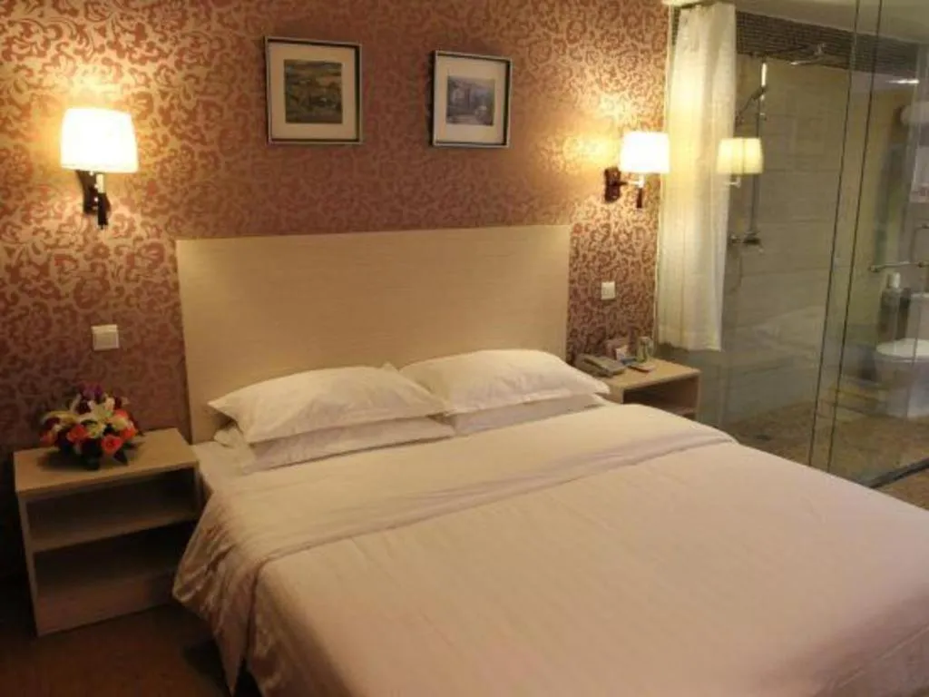 Bed in Pankun Business Hotel