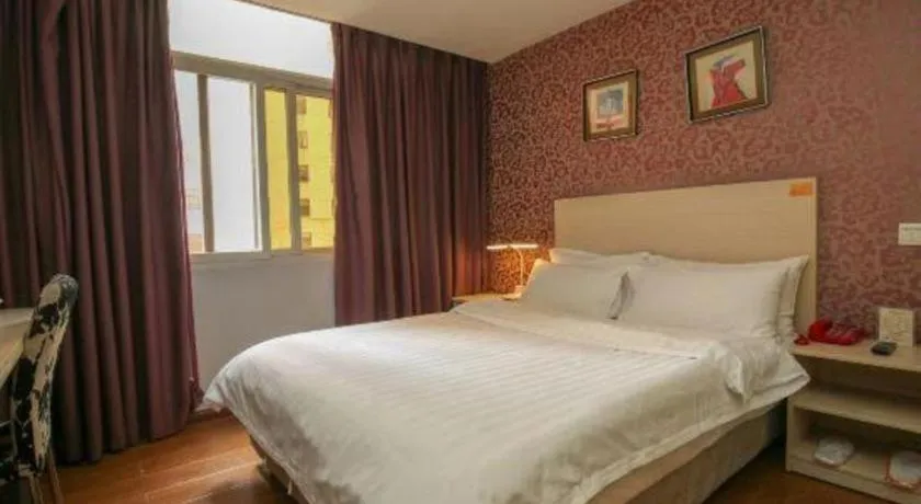 Bed in Pankun Business Hotel