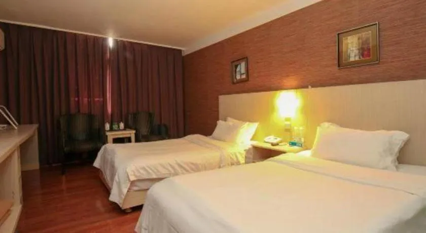 Bed in Pankun Business Hotel