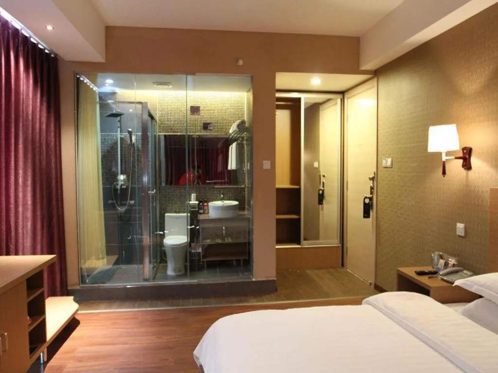 Bed in Pankun Business Hotel