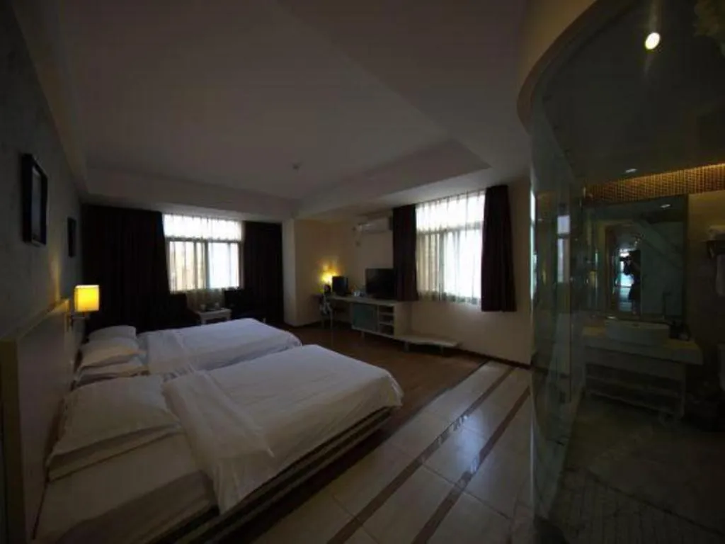 Bed in Pankun Business Hotel