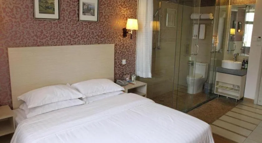 Bed in Pankun Business Hotel