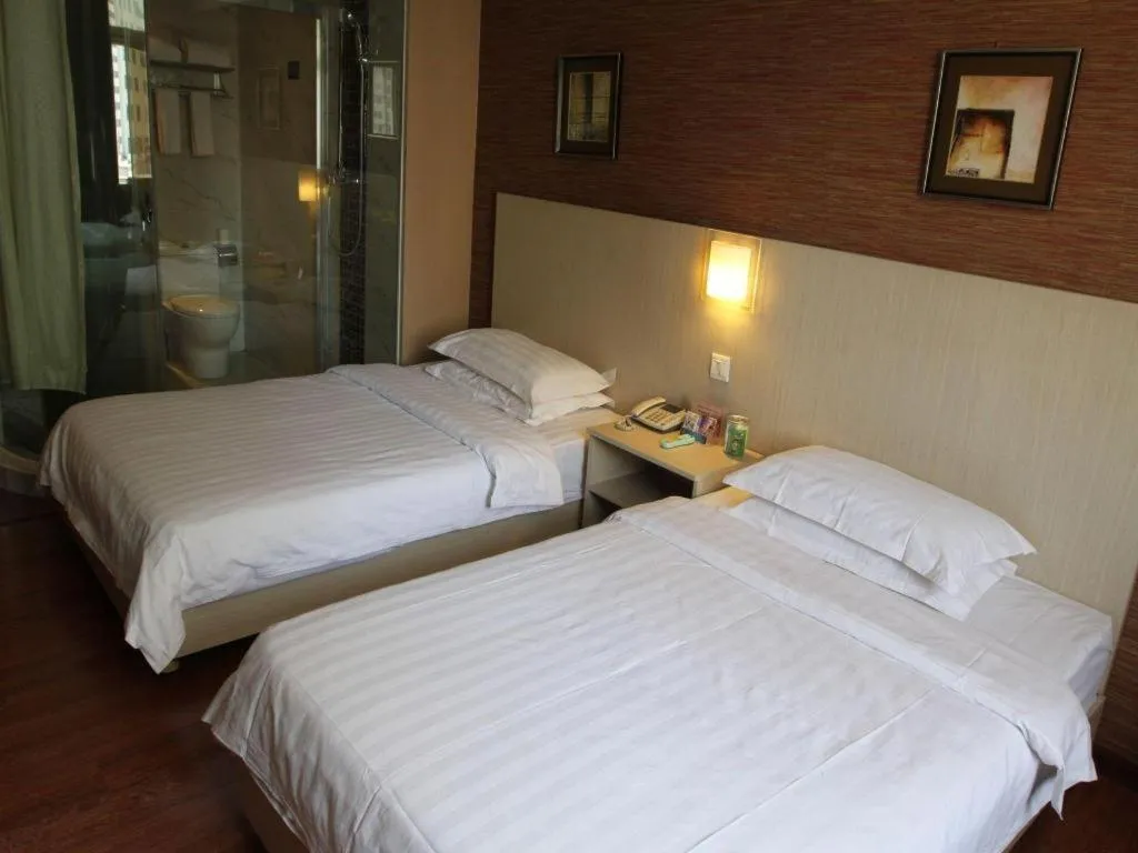 Bed in Pankun Business Hotel