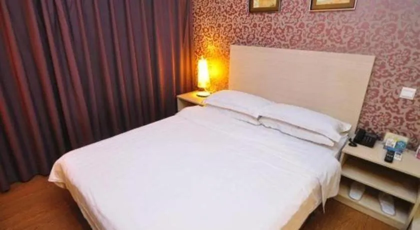 Bed in Pankun Business Hotel