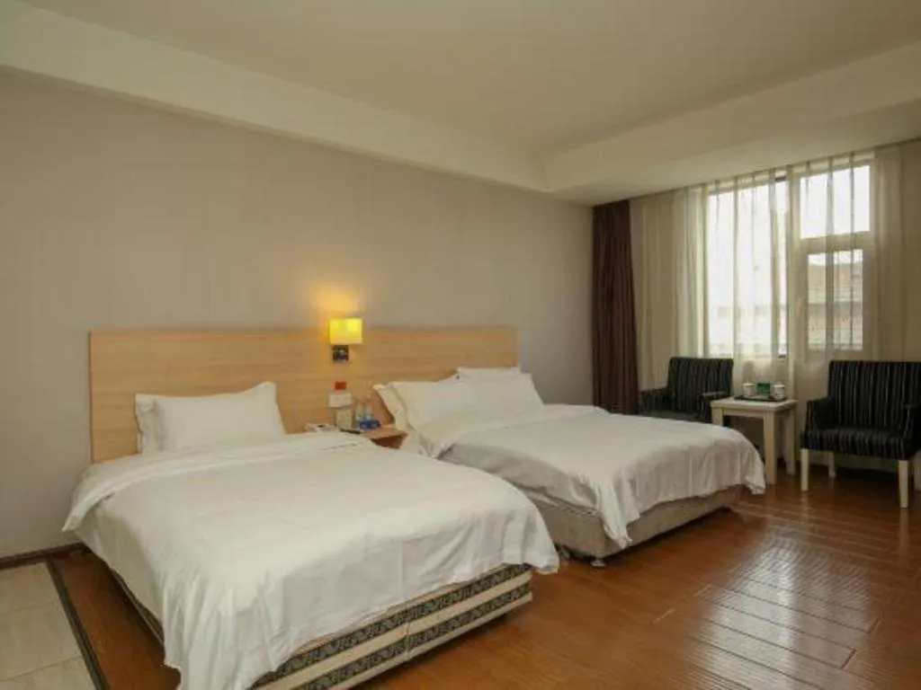 Bed in Pankun Business Hotel