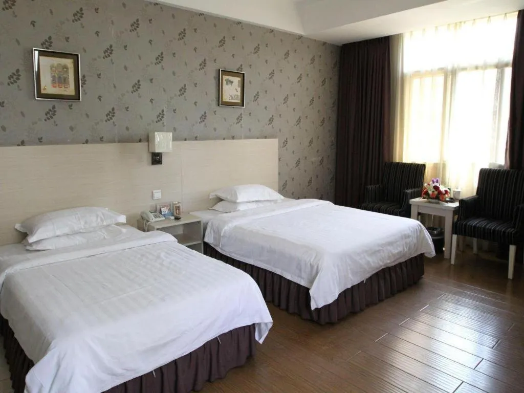 Bed in Pankun Business Hotel