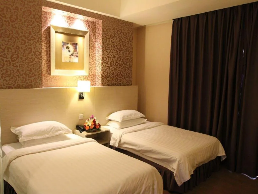 Bed in Pankun Business Hotel