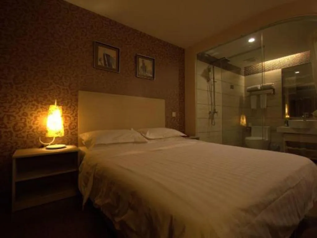 Bed in Pankun Business Hotel