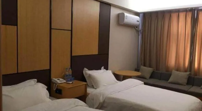 Bed in Pankun Business Hotel