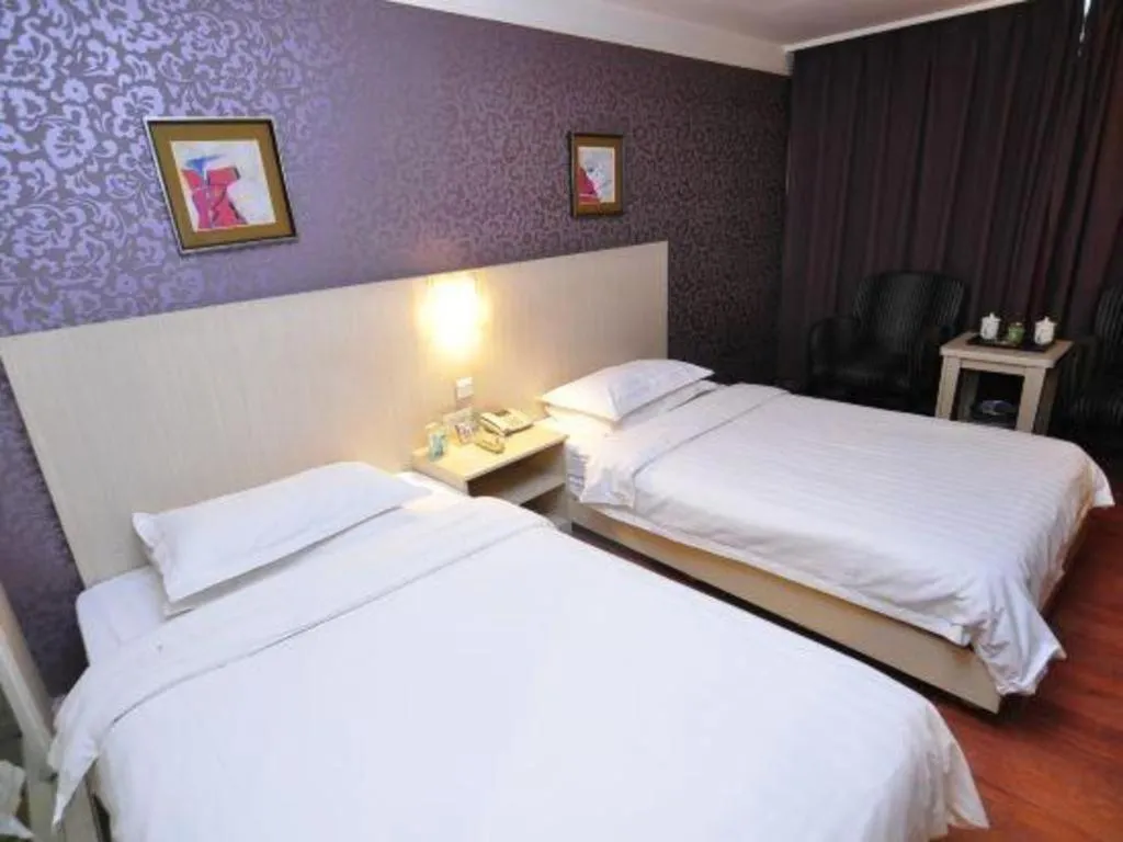 Bed in Pankun Business Hotel