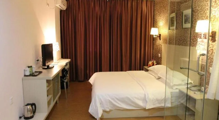 Bed in Pankun Business Hotel