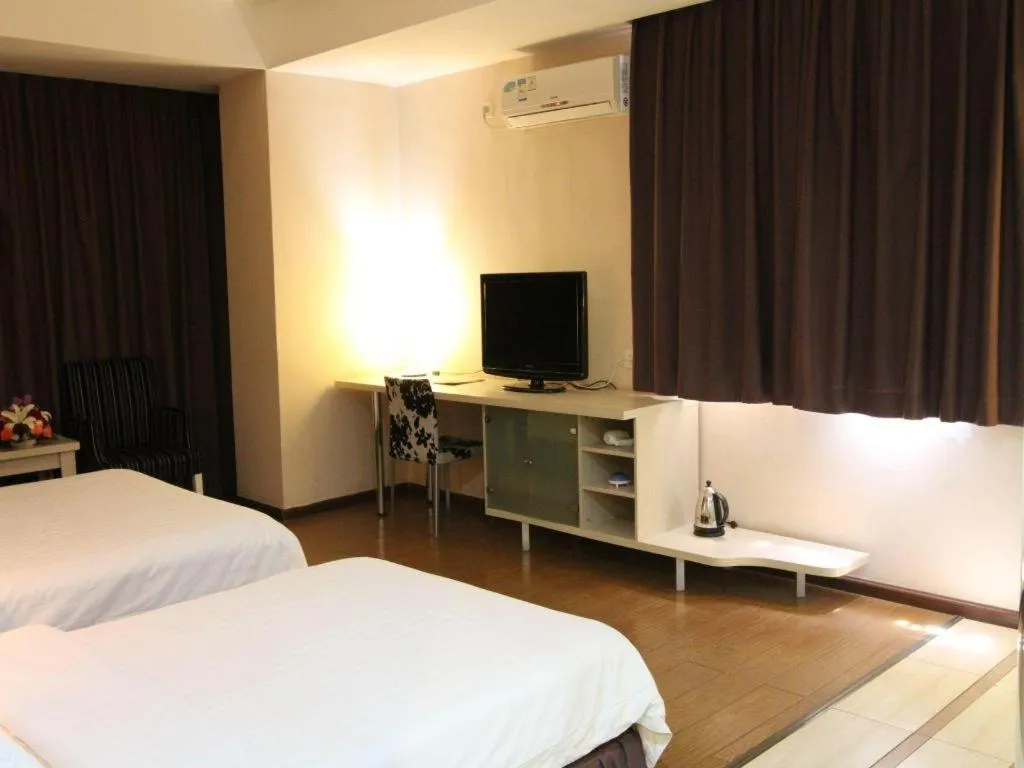 Bed in Pankun Business Hotel