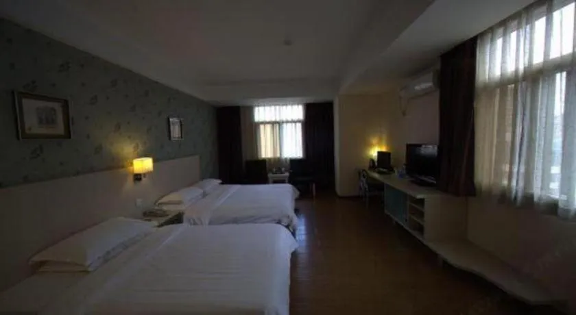 Bed in Pankun Business Hotel