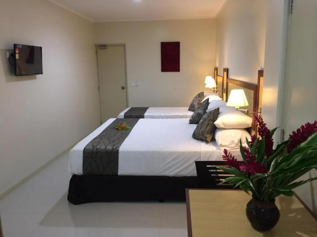 Bed in Victoria Palms Hotel