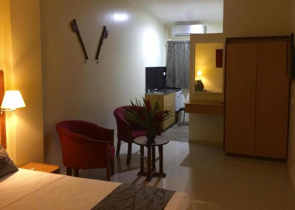 Bed in Victoria Palms Hotel