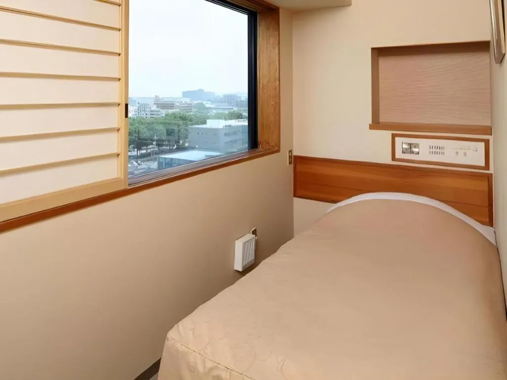 Bed in Hotel Grand Shinonome