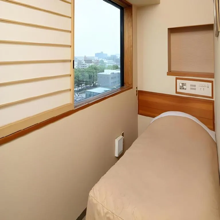 Bed in Hotel Grand Shinonome