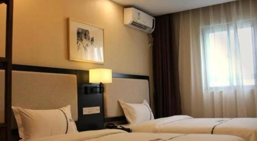 Bed in BOOK PAVILION HOTEL