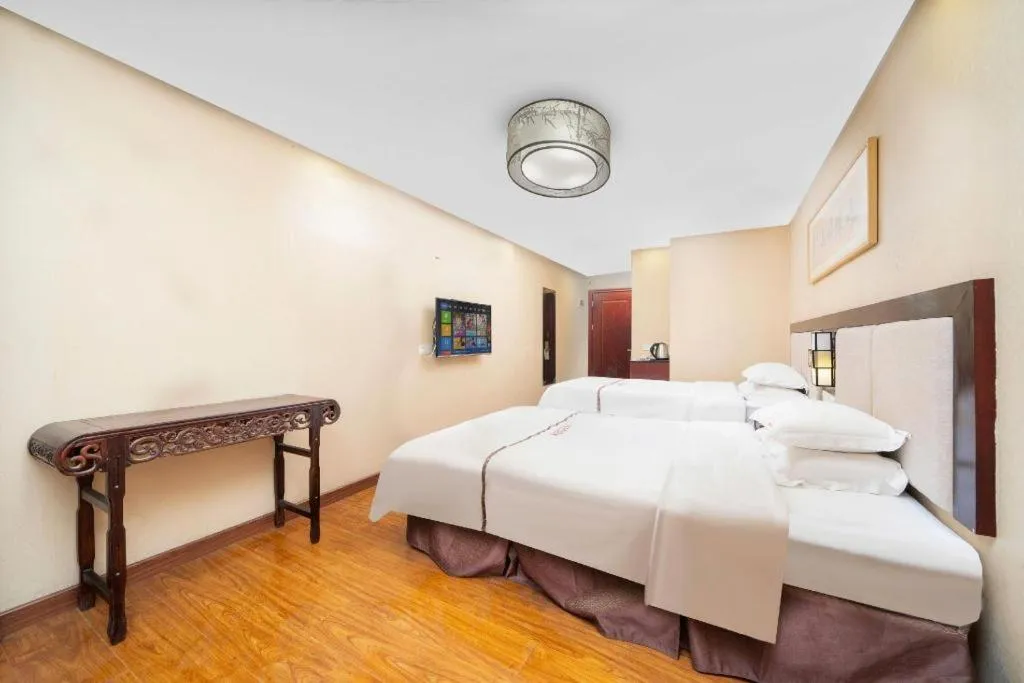 Bed in BOOK PAVILION HOTEL