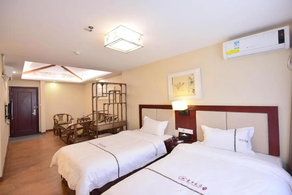 Bed in BOOK PAVILION HOTEL