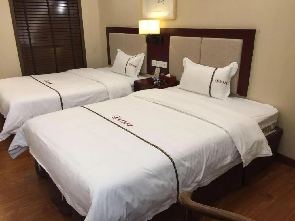 Bed in BOOK PAVILION HOTEL